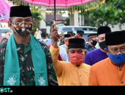 Pemda Gorut Sambut Danrem 133/NW dengan Adat Mopotilolo