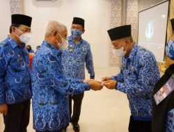 Buka Muskab VI Korpri Asahan, Bupati Surya Serahkan Kartu Keanggotaan Elektronik
