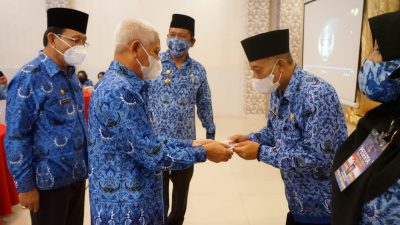Buka Muskab VI Korpri Asahan, Bupati Surya Serahkan Kartu Keanggotaan Elektronik
