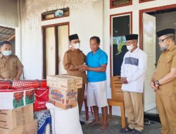 Wabup Thariq Serahkan Bantuan Bagi Korban Kebakaran di Atinggola