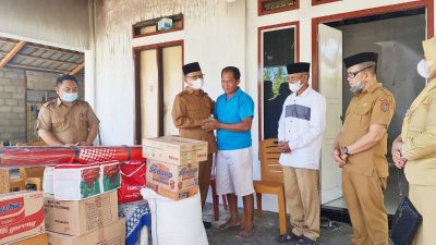 Wabup Thariq Serahkan Bantuan Bagi Korban Kebakaran di Atinggola