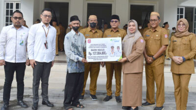 BPJAMSOSTEK Serahkan Santunan Rp137 Juta Kepada Ahli Waris Petugas Kebersihan di Bone Bolango