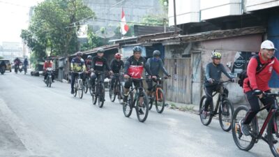 Bupati Asahan Gowes Sejauh 23 KM dan Imbau Pasang Bendera Merah Putih