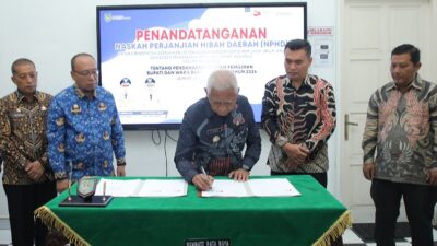 Bupati Surya dan Ketua KPU Asahan Tandatangani NPHD Pilkada 2024
