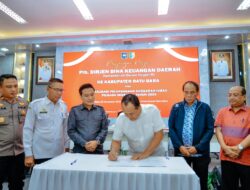 Bupati Batu Bara dan Penyelenggara Pemilu Tandatangani NPHD Pilkada 2024