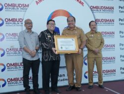 Wabup Asahan Terima Piagam Penghargaan dari Ombudsman Sumut